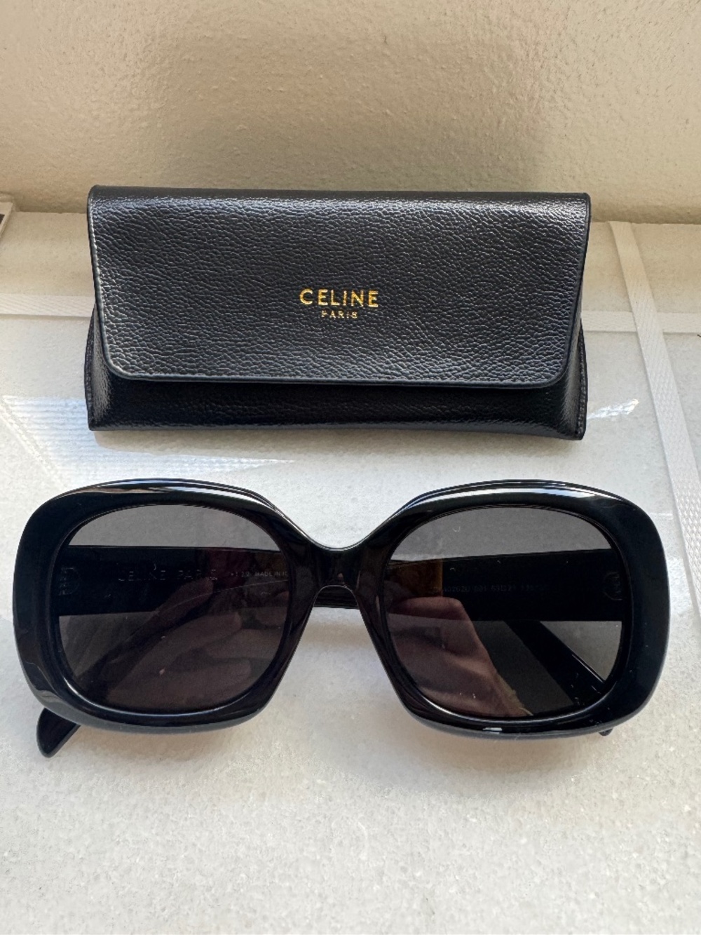 Celine sunglasses black with gold logo oversized